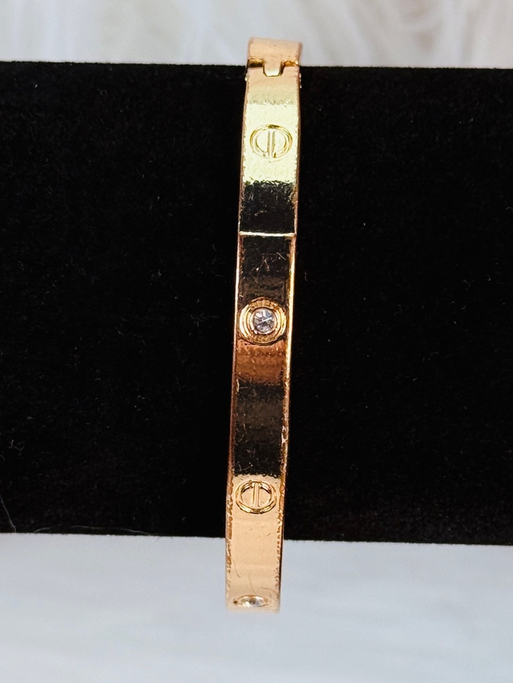 Elegant Goldtone hingled Bangle Bracelet